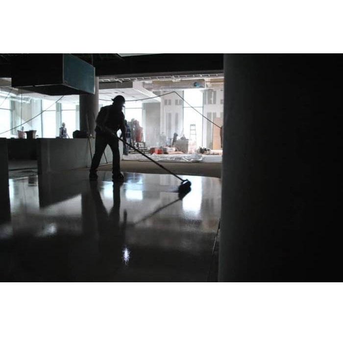 Contractor using CTS Rapid Set TRU self-leveling underlayment